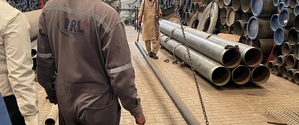 Indus Trading Co. team inspecting pipe inventory in the yard
